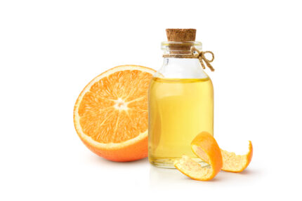 Orange,Essential,Oil,With,Orange,Fruit,And,Peel,Isolated,On